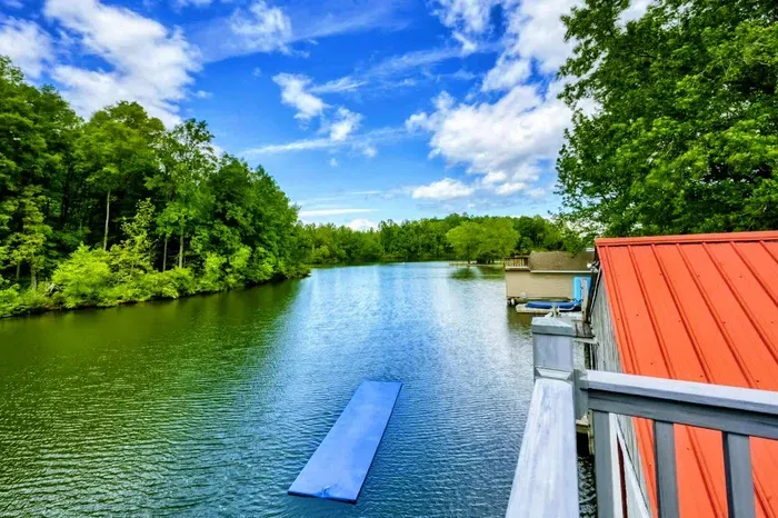 Start your day with breathtaking views of Lake Anna from the deck, featuring a floating mat for endless waterfront fun.