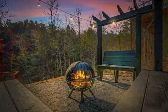 Amazing Outdoor Firepit area with built in seating for 10! relax by the fire, take instagram worthy pictures and just take in the serenity of the space and the mountains!