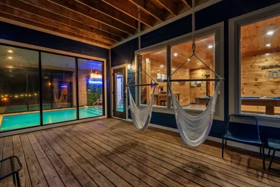 Beautiful spacious decks that complement the pool and the hot tub with 2 swings. Swing away!