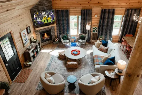 Picture this: a crackling fire, a couch big enough for the whole crew, and plenty of chairs for late-night laughs or morning coffee. The great room is where your getaway memories take shape.