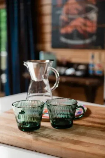 From the first cup of coffee to the last toast of the night, the dining room is designed for connection... big enough for the group, cozy enough for small moments