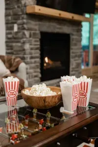 Movie night, Camp Kindred-style. Popcorn in hand, fire roaring, friends all around