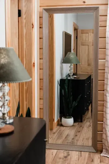 This room is designed for ease: storage for your gear, warm touches that invite you to unpack and stay awhile, and the comfort of knowing you’re close to everything while still tucked away in your own haven