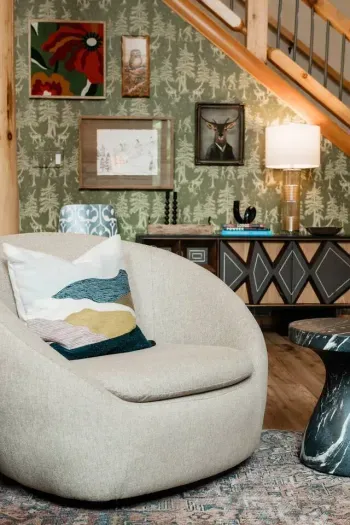 This isn’t just decor... it’s discovery. Each piece, from the whimsical wallpaper to the layered art, was chosen to spark personality and imagination the moment you settle in