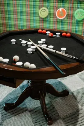 Shuffleboard, foosball, bumper pool… no need to ‘buck’ tradition — games are what camp’s all about