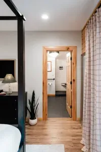 Wake up, wander just a few steps, and find your private ensuite waiting. Thoughtful lighting, a spa-inspired shower, and plenty of space to recharge make this suite a welcome comfort between trail time and family time