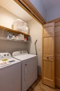 Need to freshen up or dry your socks after a day on the slopes? Our laundry room has you covered! You'll also find a children's step stool, a first aid kit for peace of mind, and an ironing board to keep you looking your best during your stay.