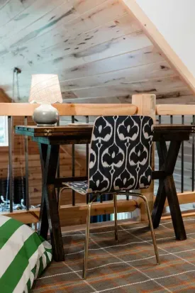 Whether you’re sneaking in a quick call or spreading out a puzzle, this loft workspace flexes with you & you're always connected to the hum of the Great Room below