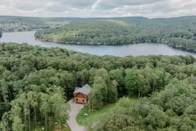 Tucked on a one-acre wooded lot, Camp Kindred feels like your private retreat. Just minutes from Wisp’s slopes and ASCI whitewater, you may catch the distant sound of boats on the lake—close enough to feel the energy, far enough to keep the peace