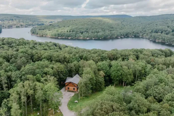 Tucked on a one-acre wooded lot, Camp Kindred feels like your private retreat. Just minutes from Wisp’s slopes and ASCI whitewater, you may catch the distant sound of boats on the lake—close enough to feel the energy, far enough to keep the peace