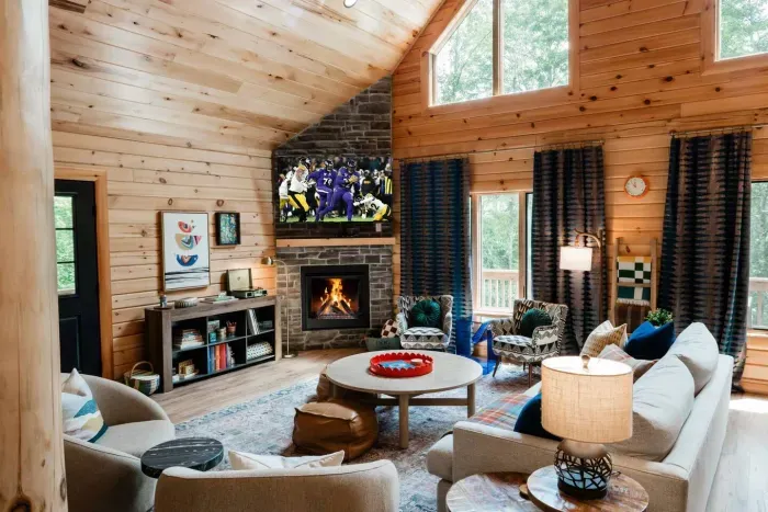 Centered around a large coffee table, the Great Room offers a 93″ Crate & Barrel sofa, two swivel chairs, and two standard chairs — plenty of comfortable seating for movie nights, game sessions, or sharing a bottle of wine