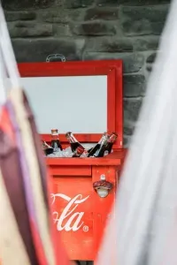 Just add fun — the Camp Kindred cooler keeps drinks on ice so refreshments are always within reach. Nostalgic vibes included (Cokes shown not included)