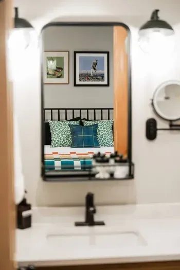 An ensuite bathroom just steps from your bed means you can tee off your day with ease—whether that’s chasing lake views, trail adventures, or an actual round of golf
