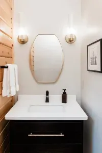No need to wander far: this main floor powder room keeps things easy for guests and gatherings