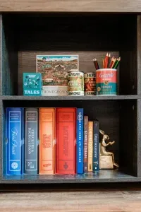 Not just books on the shelf.. these classics are actually your favorite games, waiting for a match!  Paired with quirky details (hello, canned beans from nearby Wild Ember Bread), it’s all part of Camp Kindred’s playful spin on nostalgia