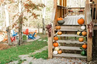 Autumn settles in softly at Camp Kindred — pumpkins on the porch, golden leaves overhead, and the firepit waiting just beyond the steps. It’s the season when the cabin feels its coziest, and the woods glow in every shade of kindred warmth