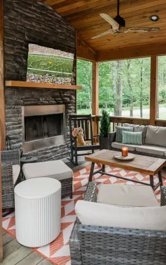 Whether its game day or a quiet night, the covered porch brings everyone together. Sip, snack, cheer, or just unwind beneath the fan—comfort and connection just steps from the dining room