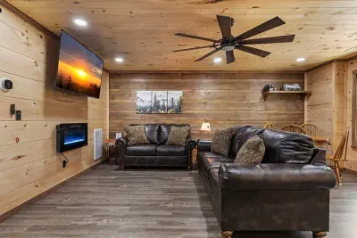 Gameroom/den. Couch makes a queen size sleeper sofa.