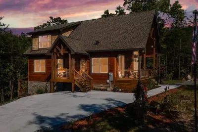 Twilight photo of cabin.