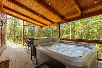 Relax in our hot tub or dine on a favorite meal at the outdoor table area.