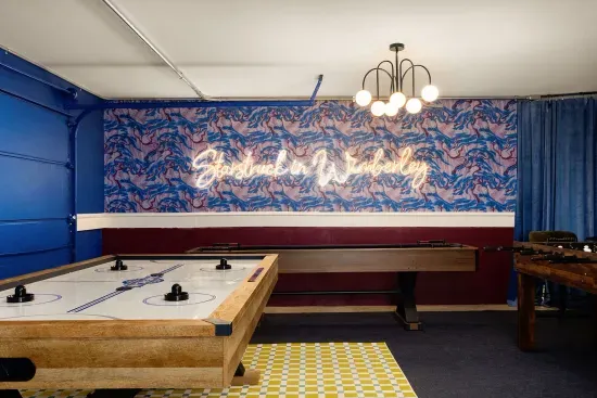 Game Room with Air Hockey and Shuffle Board