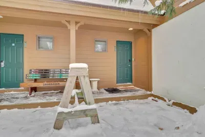 Entryway , 654 door is on the right side.  
Ski rack out front.