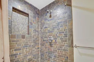 Lower level full shower. 