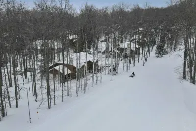 Snowmobile is in front of the unit 