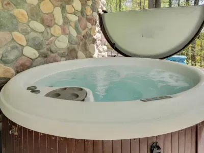 Hot tub with locking cover