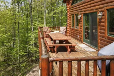 rear deck with table chairs and grille