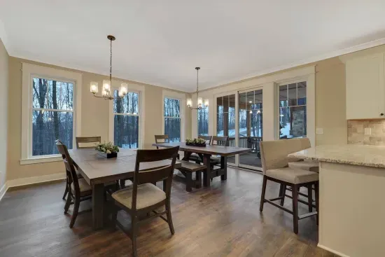 dining area main level,   note ski trial just outside the window