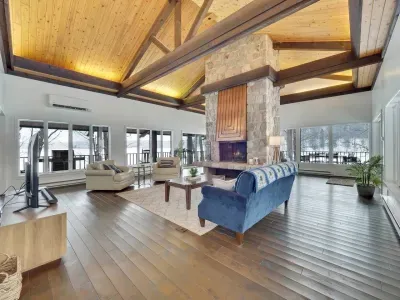 Upper Living Room with fireplace and dramatic views