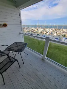 Private balcony overlooking maina on Lake Charlevoix