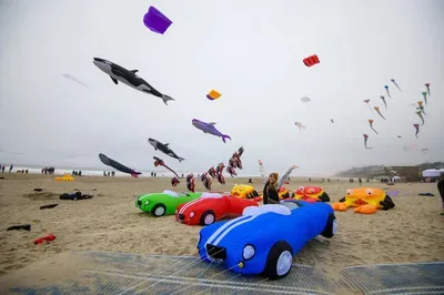 Families enjoying the Lincoln City Summer Kite Festival on the Oregon Coast