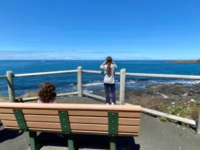 Visitors whale watching from an overlook in Depoe Bay Oregon