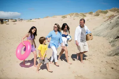 Family enjoying a Mother’s Day beach walk on the Oregon Coast