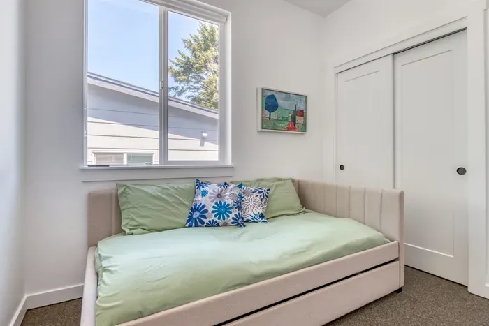 Twin Trundle Bed (2 Twins one stored under on wheels)