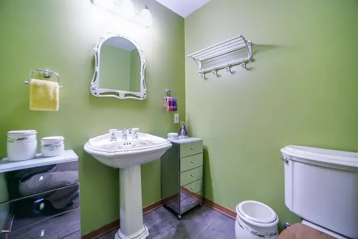 Half bath so guests don't have to tromp through your bedroom.