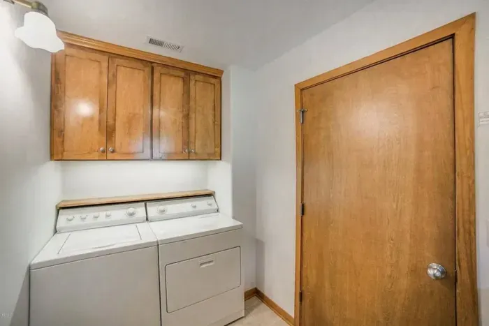 Top loading washer and dryer.