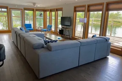 Plenty of space to sit and relax and take in the views indoors or outside on the huge deck.