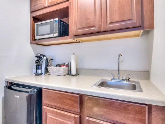 Kitchenette with Coffee Maker (drip) small fridge and microwave