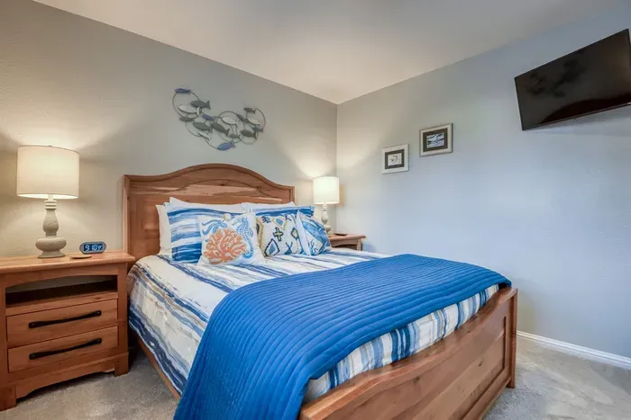 Upstairs Bedroom - All bedrooms have Smart TVs