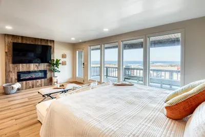 Large Screen TV and Fireplace