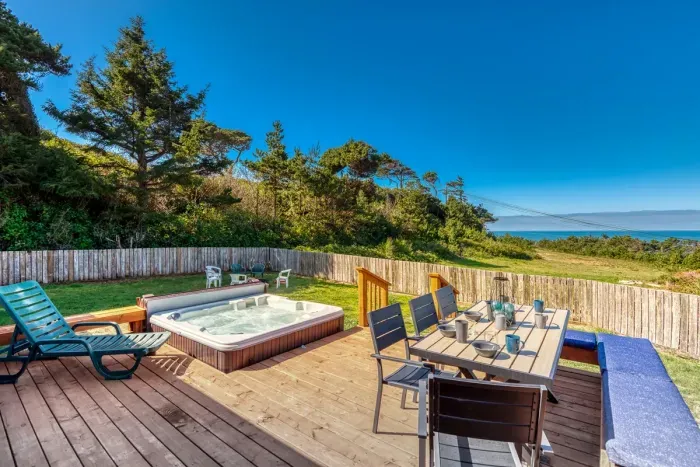 Deck with Table and Seating and Hot Tub