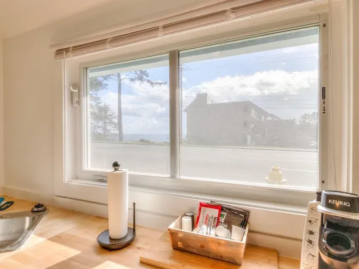 View from the Kitchen Window.  Can see the Ocean across Hwy 101