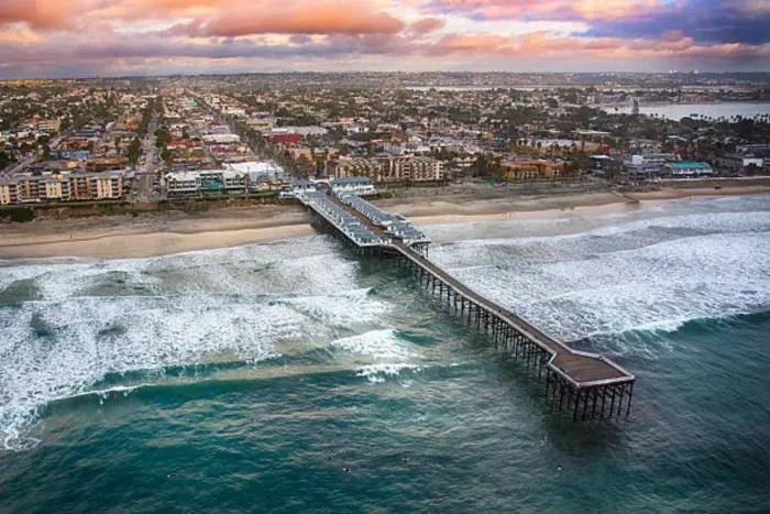 Iconic Mission Beach and its bustling boardwalk are just steps away. Stroll along the pier, watch surfers ride the waves, or take in vibrant sunsets over the Pacific. Endless shops, restaurants, and oceanfront fun await right outside your door.