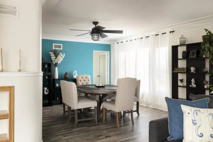 The dining area that leads into the hallway where the bedrooms are located