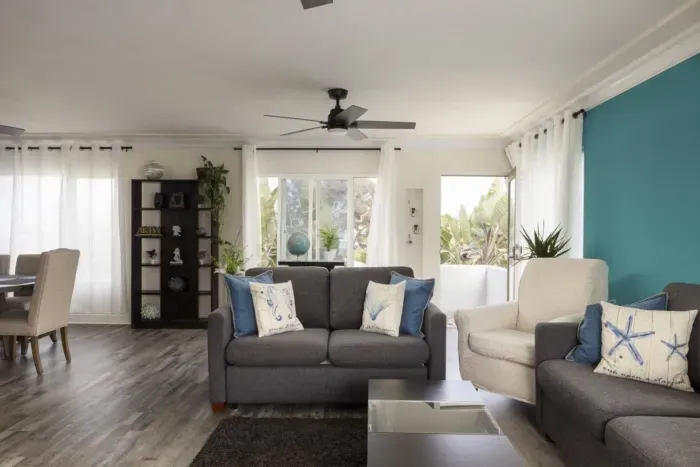 The living area viewing the entrance. We have multiple ceiling fans to help circulate air during the warmer months