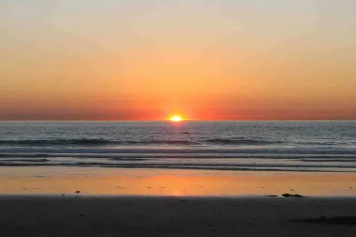 Enjoy the beach sunsets just steps from your place!