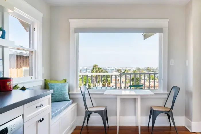 Cozy dining nook with scenic outdoor views.